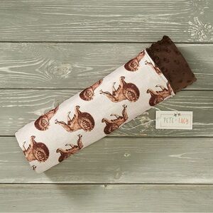 Brown toned cozy lion minky blanket sized 31” x 31”